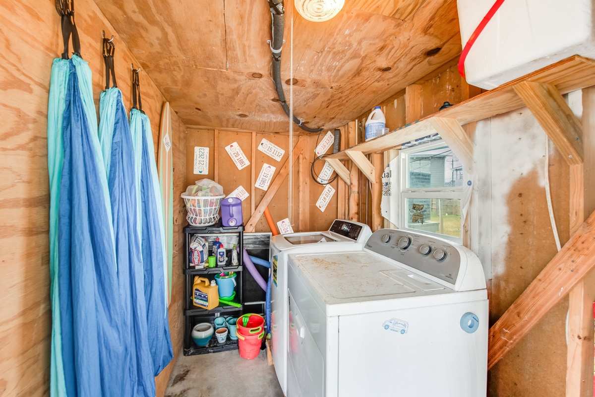 Your private laundry room keeps everything fresh during your stay, with full-size washer and dryer tucked away in this cozy space.
