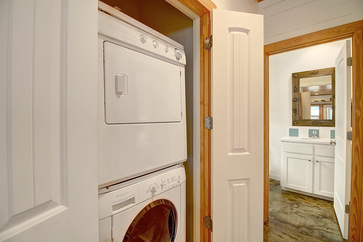 Your own in-unit washer and dryer tucked neatly in a closet, making longer stays effortless and convenient.