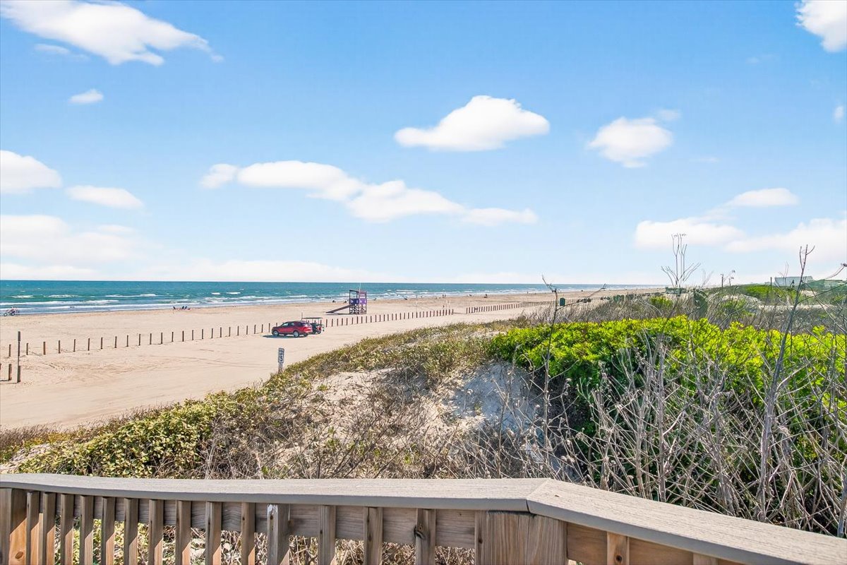 Stunning beachfront location with direct access to pristine sandy shores and ocean waves.