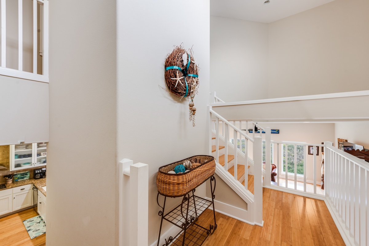 Step into your bright, airy hallway where coastal charm meets comfort—perfect for unwinding after beach adventures.