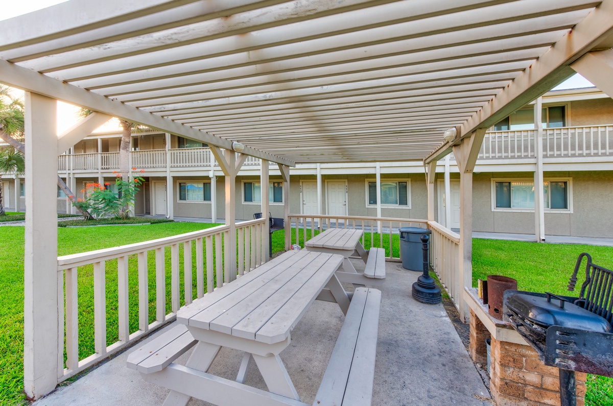 Fire up the grill and gather around your private covered patio, perfect for outdoor dining with picnic tables and BBQ facilities.
