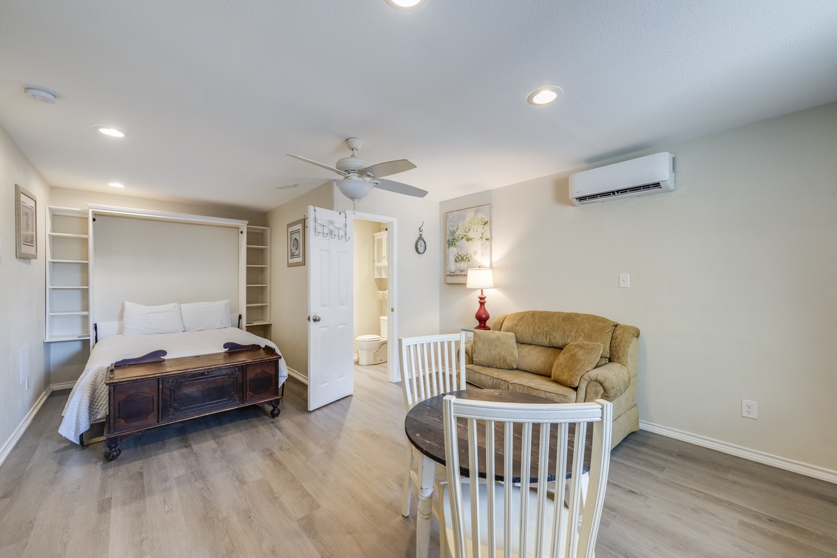 Your inviting suite blends comfort and convenience, with a cozy bed, relaxing seating area, ensuite bath, ample shelving, climate control, and thoughtful touches to make you feel right at home.