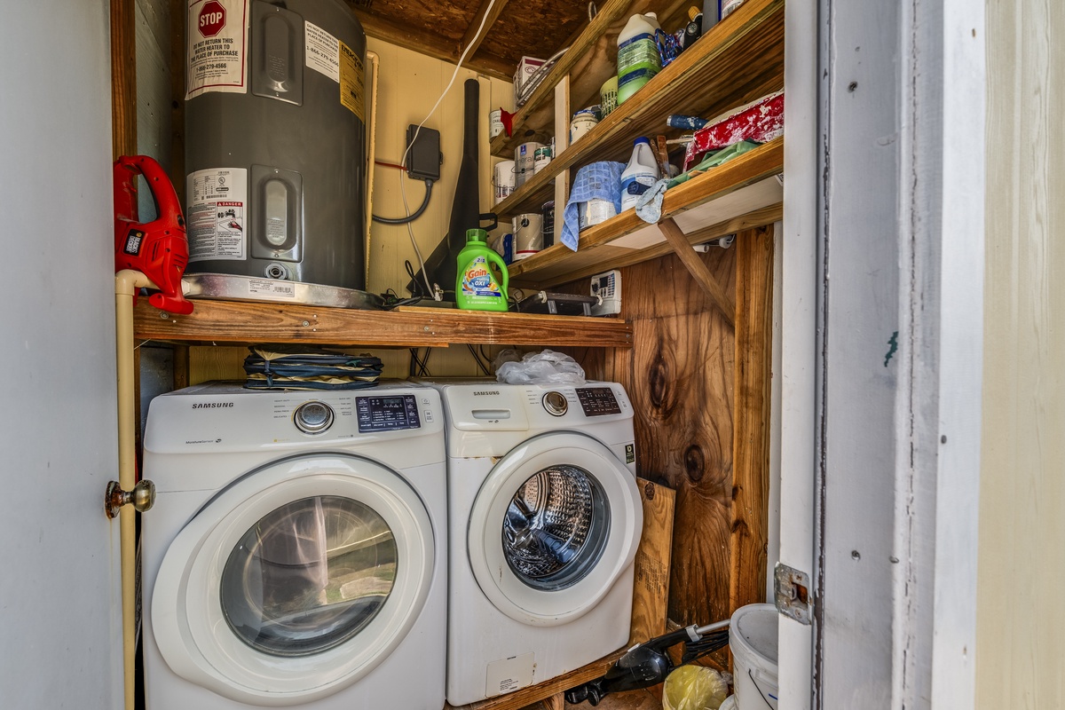 Your own washer and dryer await, tucked neatly with laundry essentials and plenty of storage to keep everything you need close at hand.