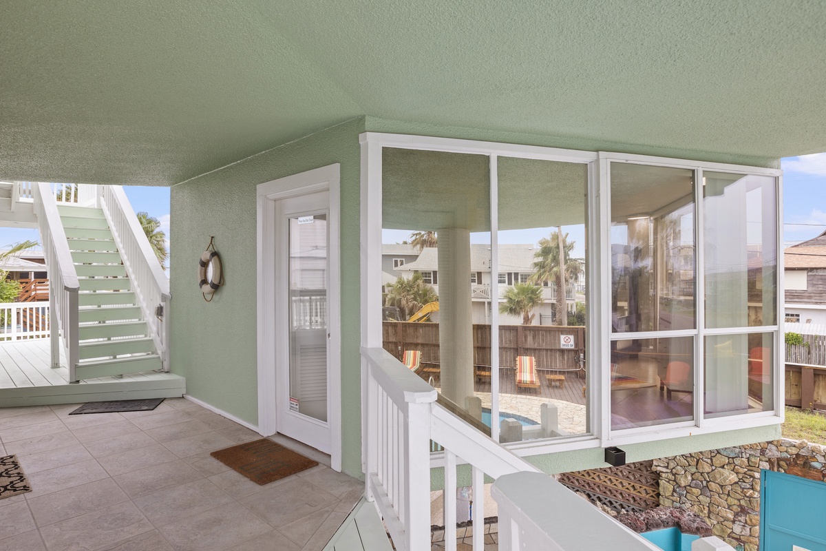 Step onto your private balcony with stunning views of the tropical neighborhood and sparkling pool below.