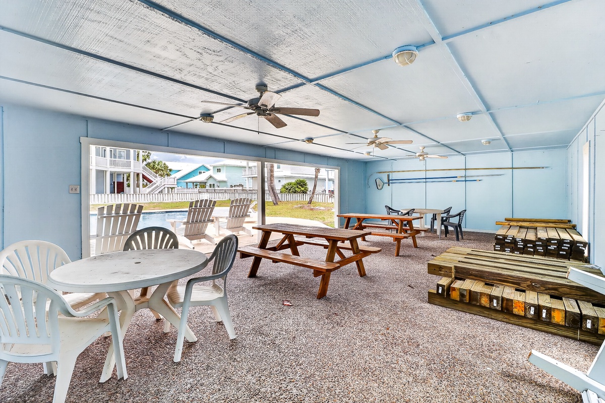 Enjoy meals and games in your covered outdoor pavilion with picnic tables, shuffleboard, and refreshing ceiling fans.
