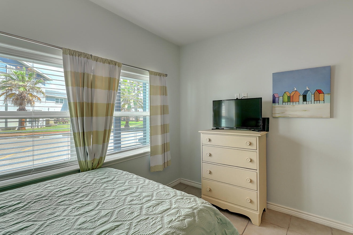 Wake up to tropical views through your bedroom windows, with palm trees swaying just outside your comfortable retreat.