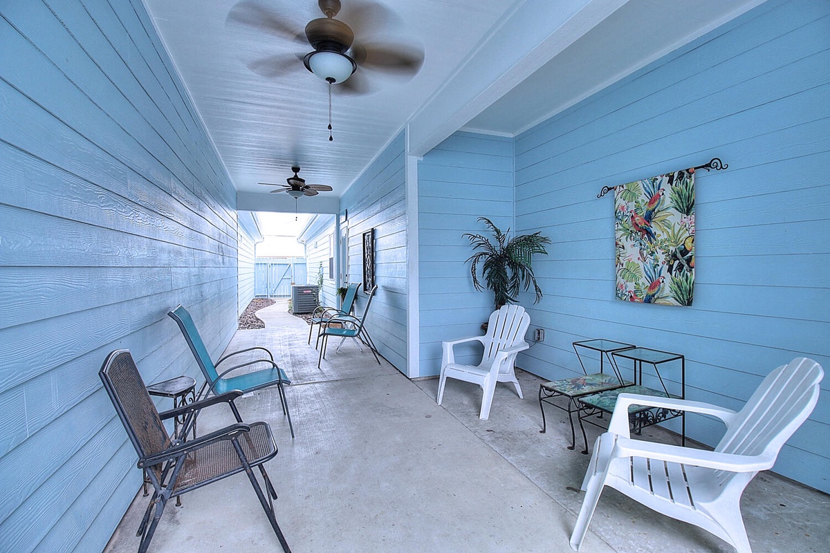 Unwind on your breezy covered porch with tropical decor and comfortable seating where you can sip morning coffee or evening cocktails.