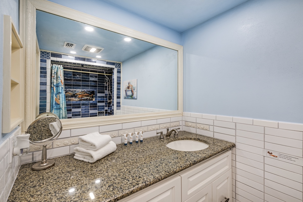 Beachy blues and elegant finishes bring a touch of seaside serenity to your stay.