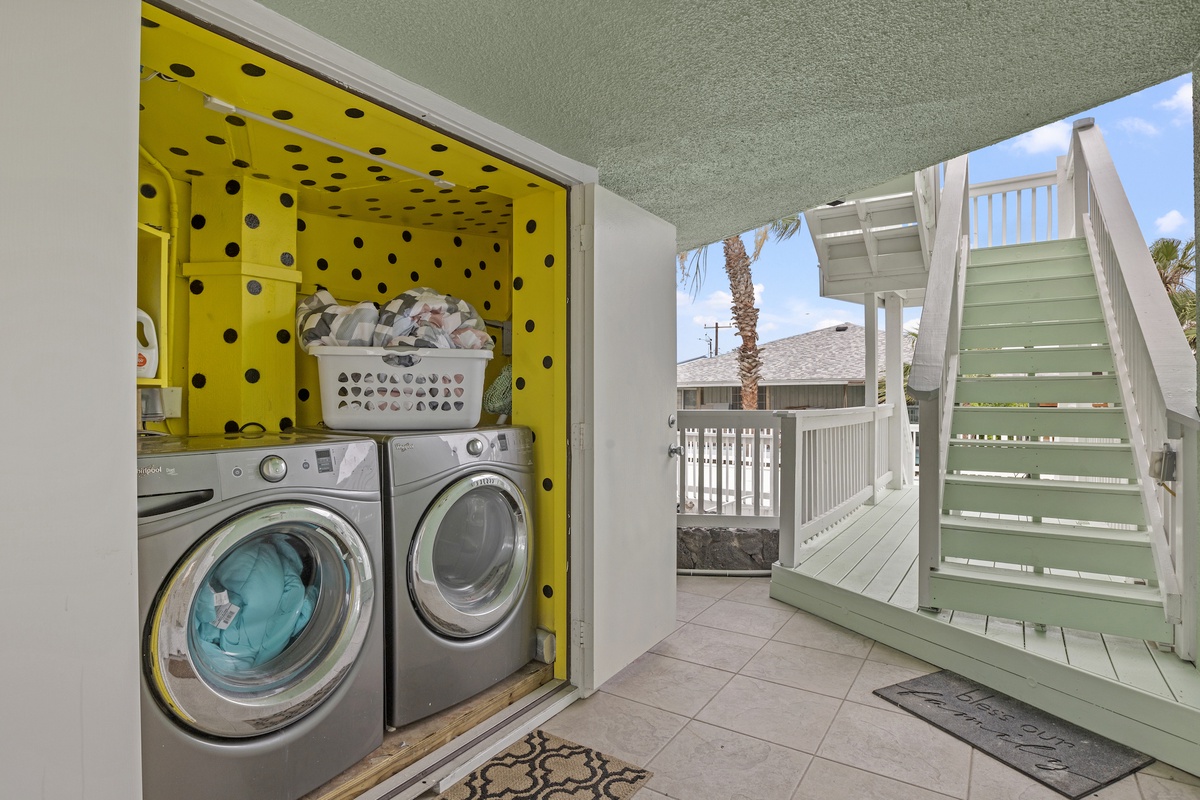 Your laundry is a breeze with full-sized washer and dryer tucked in this cheerful space steps from your door.