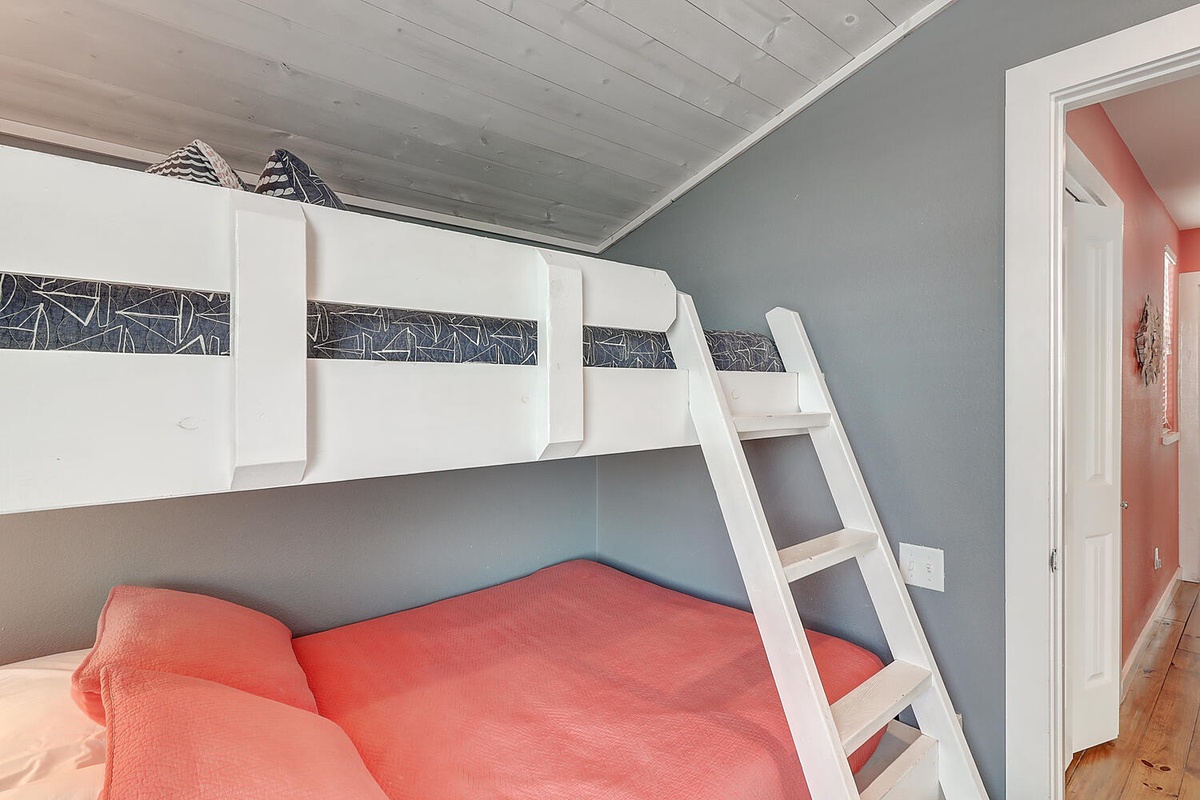 Cozy bunk bed setup maximizes your space while offering comfortable sleeping arrangements for family or friends sharing memorable moments together.