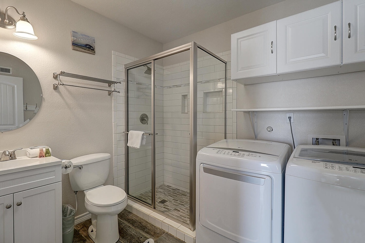 Refresh in your private bathroom with glass shower, then tackle laundry with convenient in-unit machines.