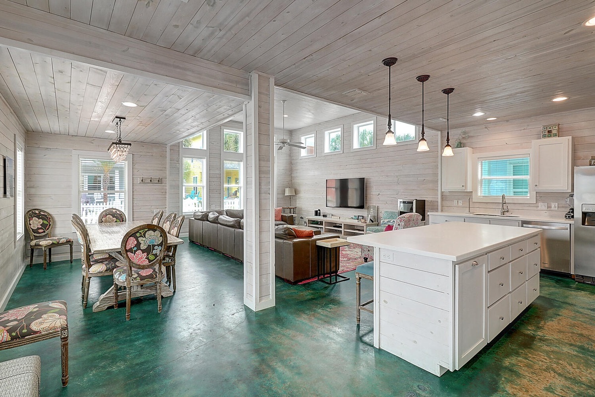 Step into your bright, open-concept haven where rustic charm meets modern comfort. Cook in your fully equipped kitchen while chatting with loved ones.