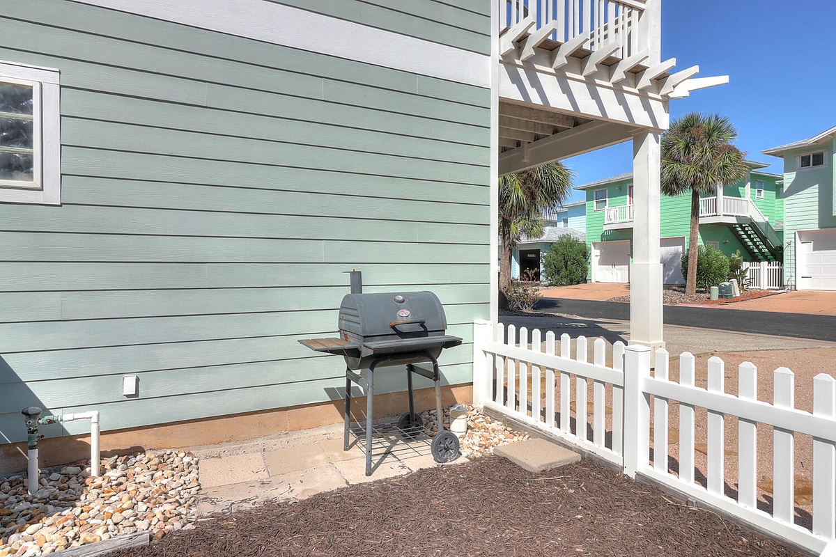 Fire up the grill on your private patio and enjoy outdoor dining with coastal charm and tropical palm views.