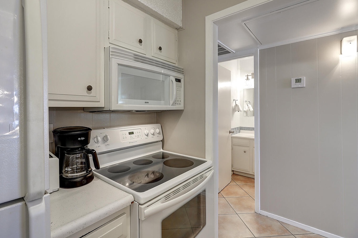 Your fully equipped kitchen features modern appliances and everything you need for home-cooked meals during your stay.