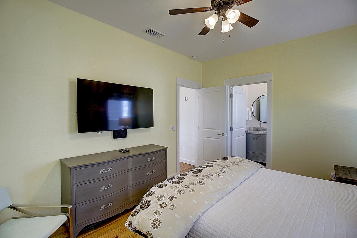 Drift off to sleep with gentle ceiling fan comfort and wake up to your private en-suite bathroom just steps away.