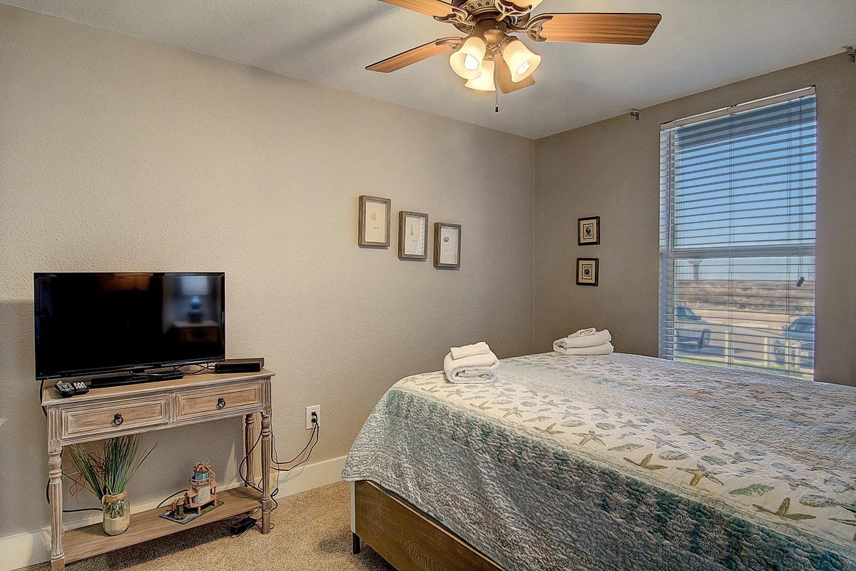 Rest peacefully in your comfortable bedroom with ceiling fan, entertainment center, and thoughtful touches that make you feel at home.