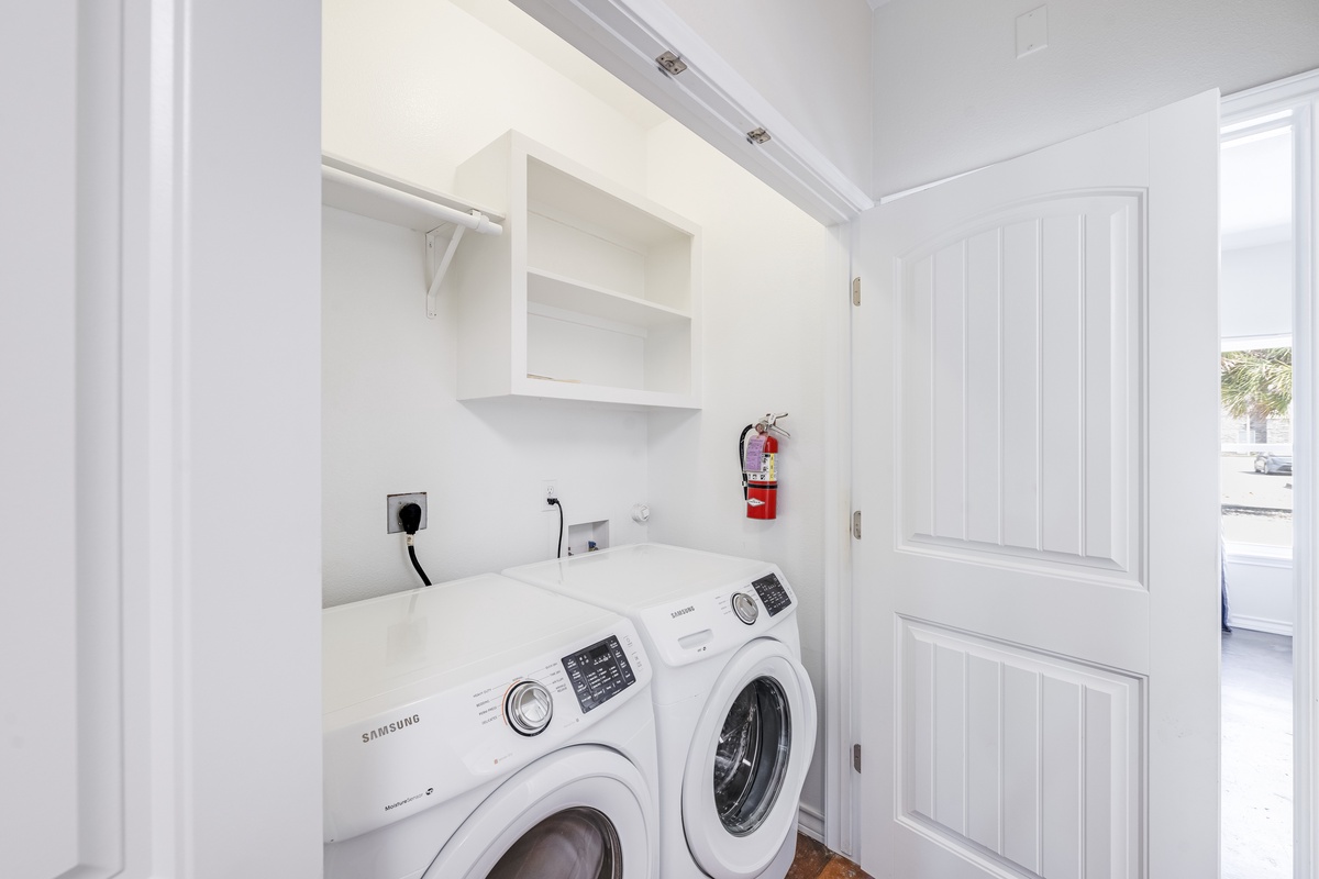 Your private laundry room features a full-size washer and dryer with built-in storage, making longer stays effortless and convenient.