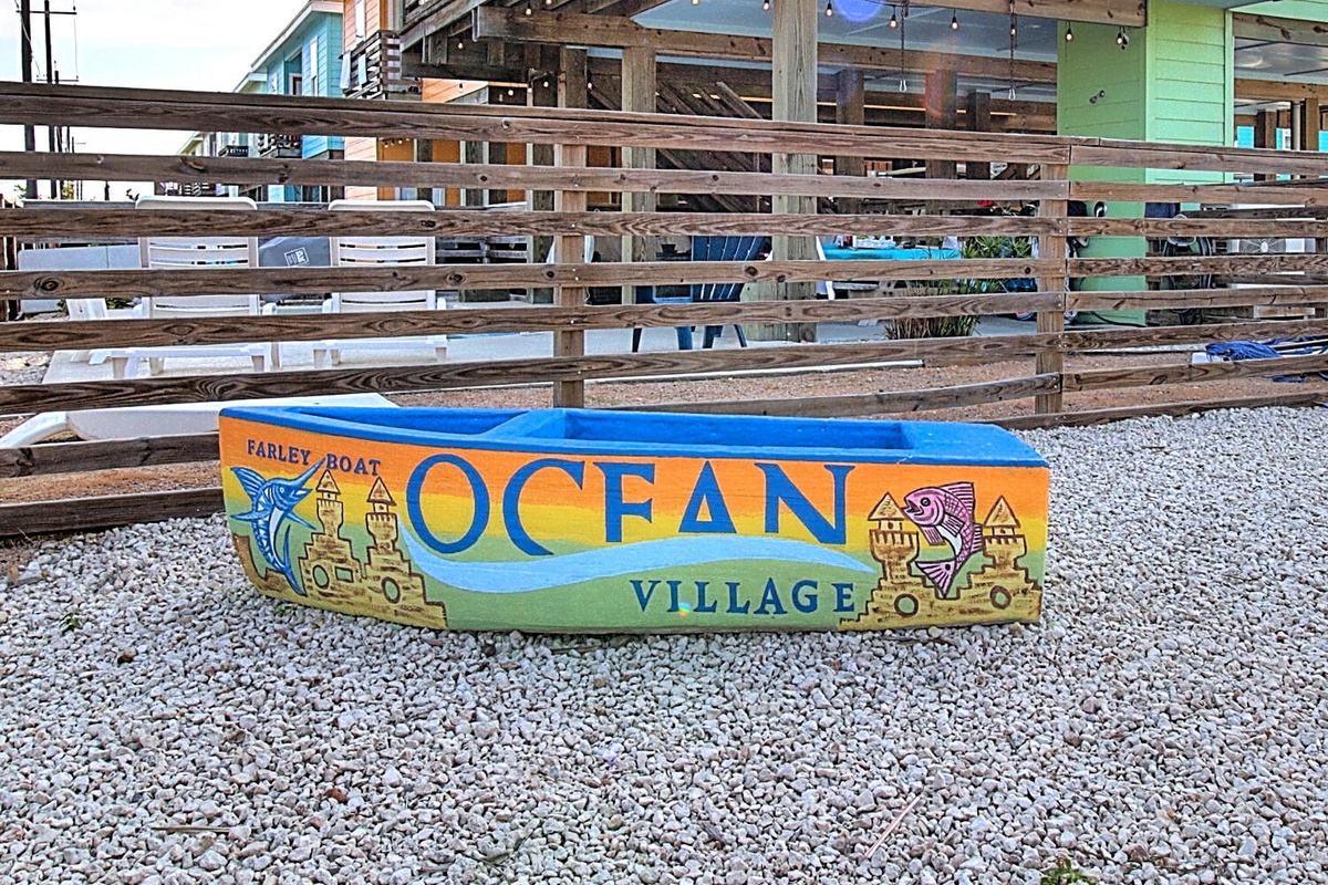 Charming Ocean Village waterfront community welcomes visitors with colorful coastal charm and maritime character.