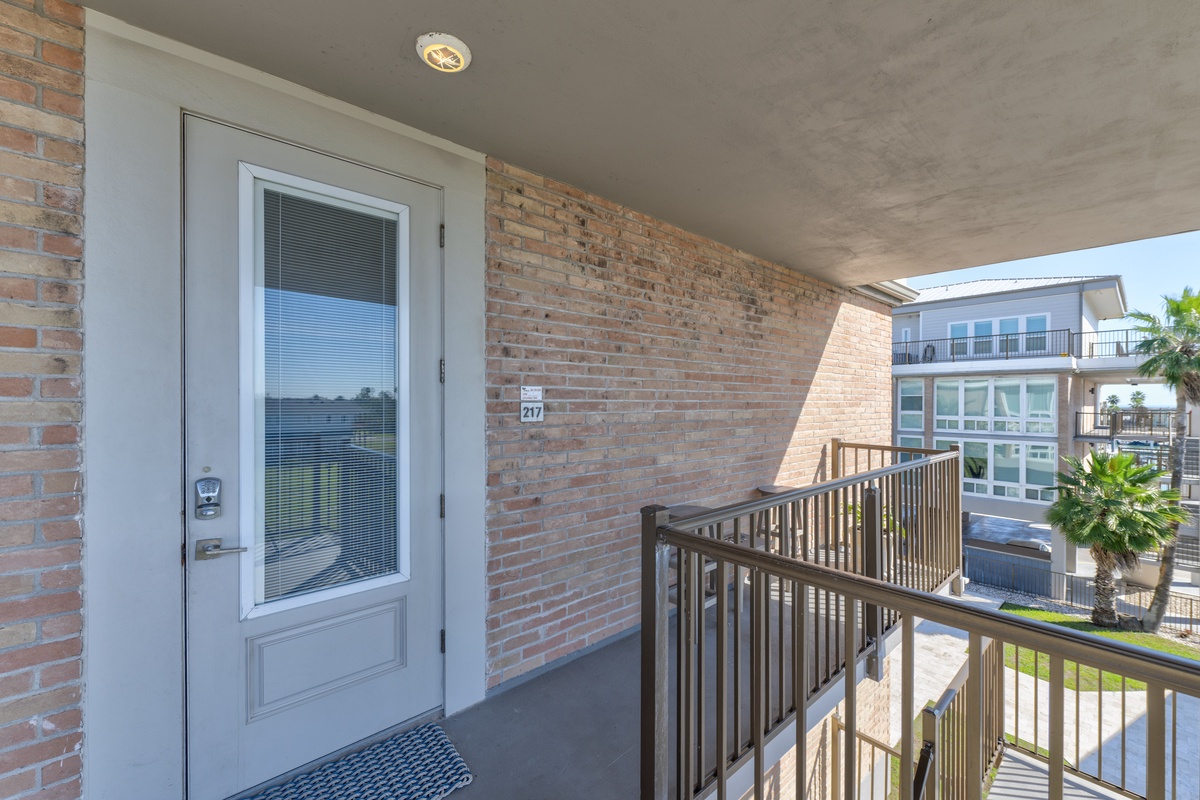 Step onto your private balcony and breathe in the fresh air while enjoying views of the surrounding neighborhood from your elevated retreat.