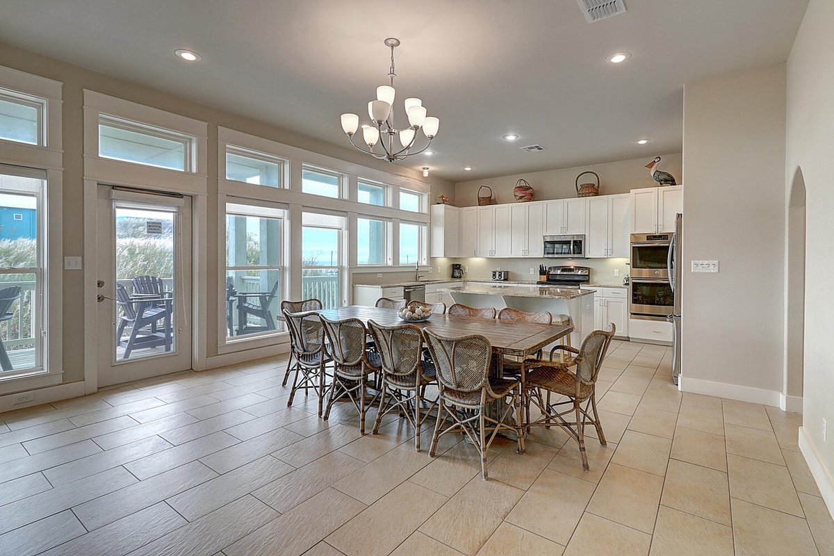Your open kitchen flows into a bright dining space where morning coffee and family meals become memorable moments together.