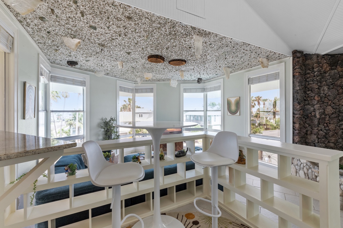 Step onto your private balcony where morning coffee becomes extraordinary, surrounded by panoramic windows and coastal breezes.