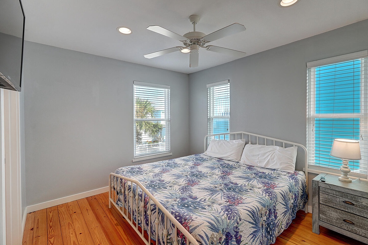 Your bedroom offers stunning sea views through bright windows, where you'll drift to sleep to ocean sounds and wake to coastal breezes.