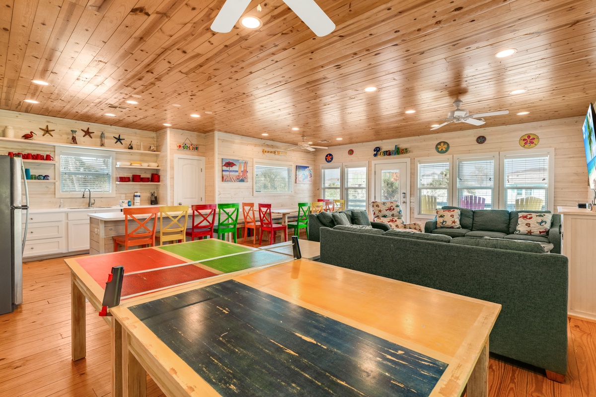Your family game room awaits with ping pong, comfy seating, and a full kitchen—perfect for memorable evenings together.