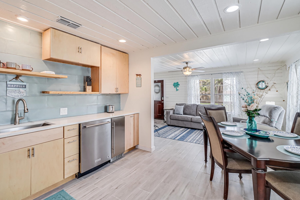 Step into your bright, open living space where modern kitchen meets cozy lounge—perfect for cooking, dining, and relaxing together.