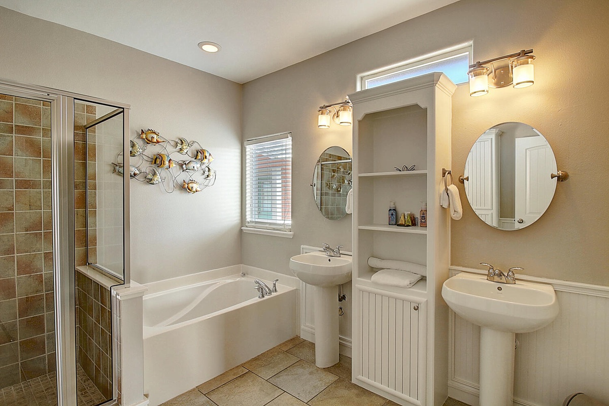 Unwind in your spacious master bathroom with dual vanities, soaking tub, and separate shower—perfect for your morning routine.