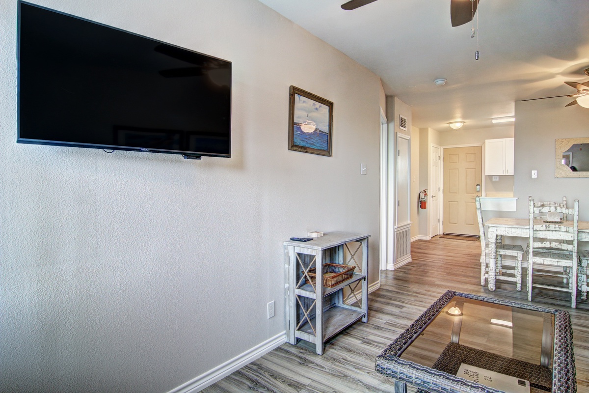 Relax in your bright, open living space with modern amenities and coastal charm for your perfect getaway.