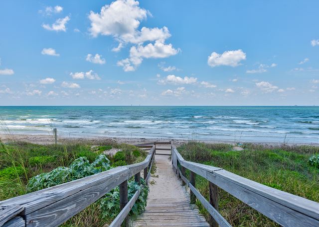 Private boardwalk leads directly to pristine ocean waters, offering your own peaceful escape to endless coastline.