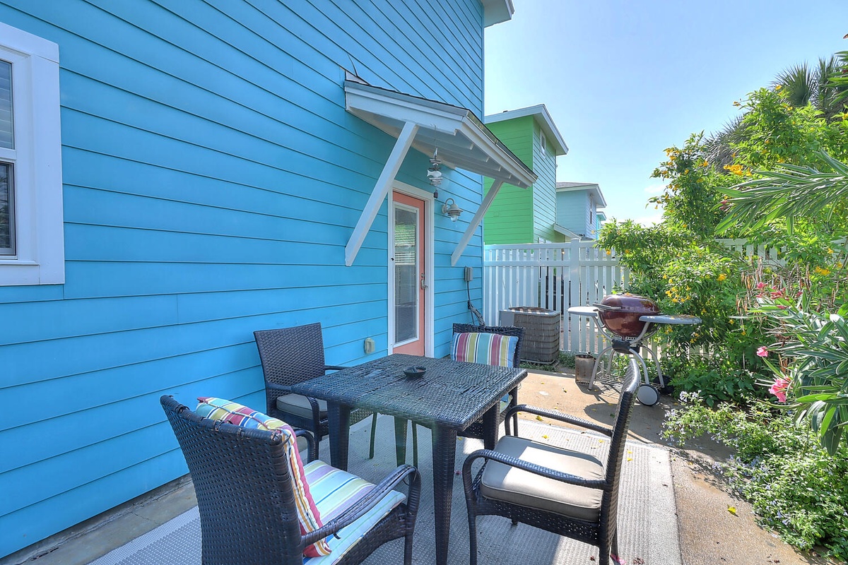 Savor morning coffee on your private patio, surrounded by lush tropical gardens and colorful island charm.