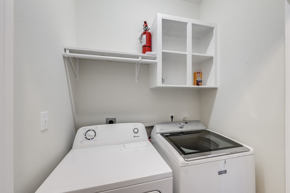 Your dedicated laundry room makes it easy to keep clothes fresh during longer stays, with convenient shelving for supplies.