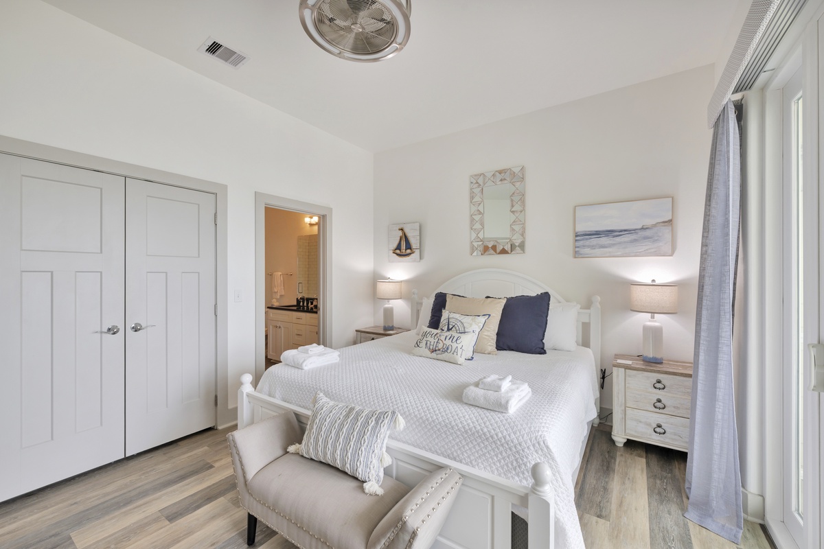 Drift into peaceful slumber in your serene coastal bedroom, where soft linens and nautical touches create the perfect retreat for restoration.