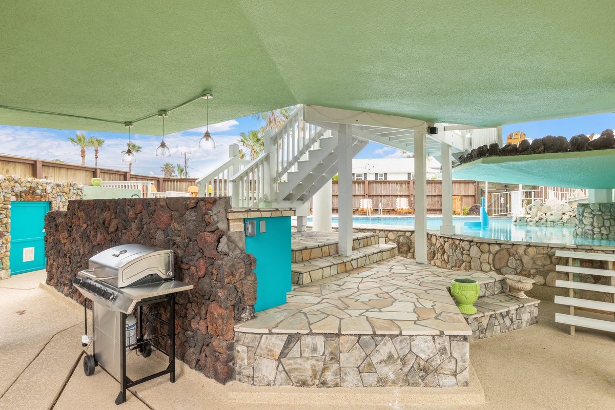 Fire up the grill on your private patio while the pool sparkles nearby, creating perfect moments for outdoor dining and relaxation.