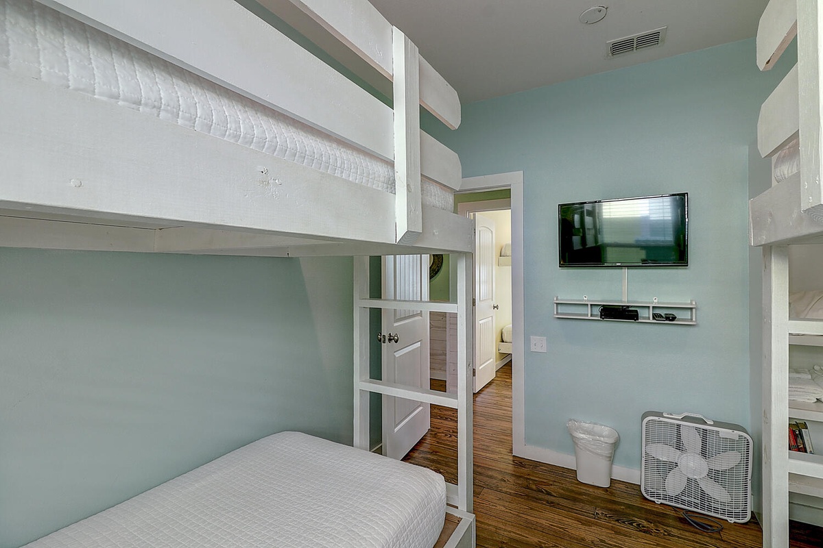 Your kids will love their own bunk bed sanctuary with entertainment center and cozy sleeping nooks for memorable vacation nights.