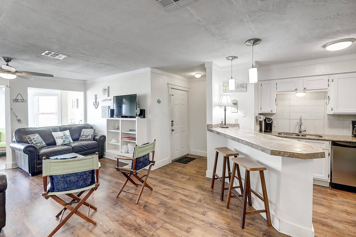 Your open-concept space flows seamlessly from kitchen to living room, perfect for relaxing or entertaining with modern comforts throughout.