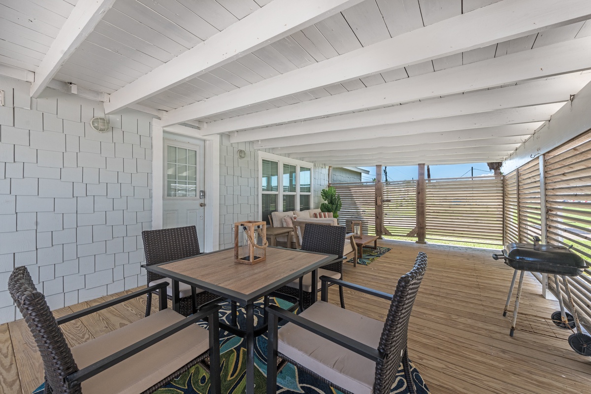 Savor morning coffee on your private covered deck, complete with dining space and BBQ for memorable meals.