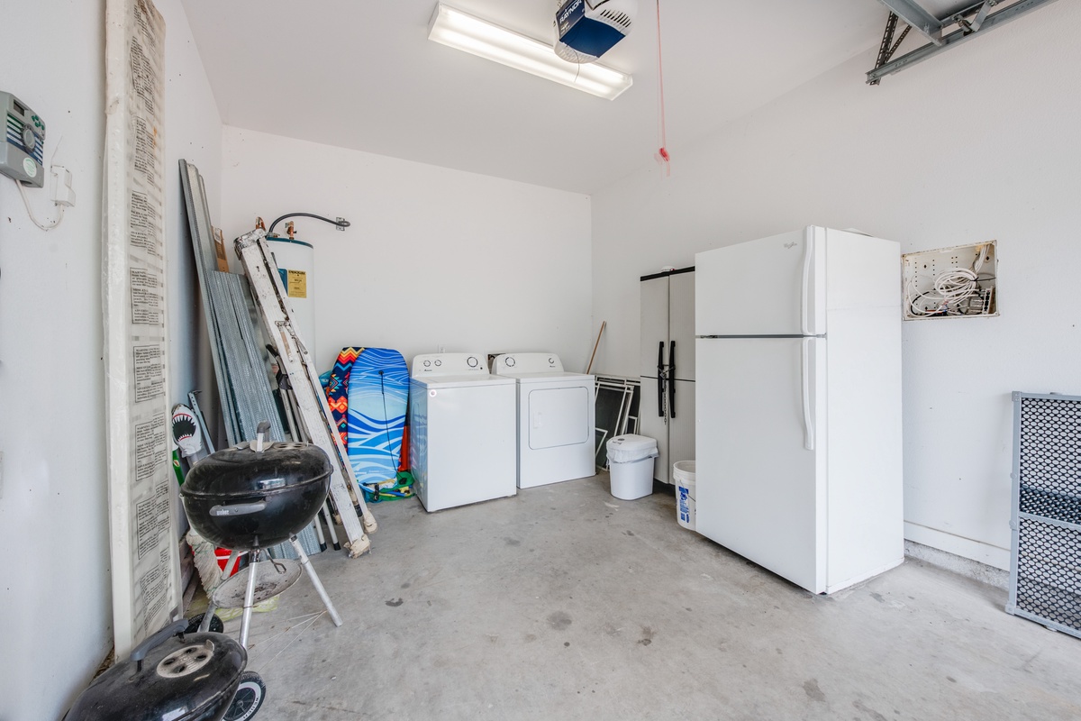 Your private utility space includes full-size washer and dryer plus garage storage for all your beach gear and belongings.