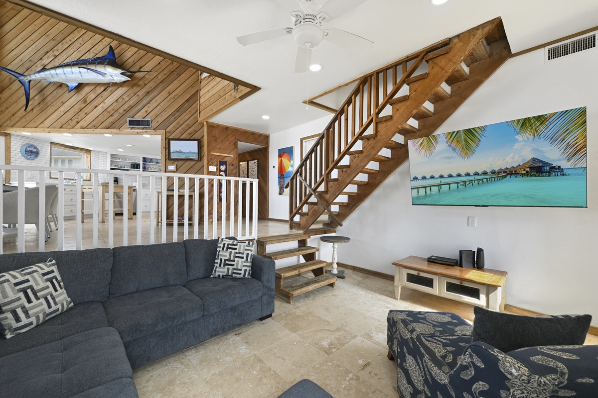 Bright open-plan living area perfect for family movie nights or game time.