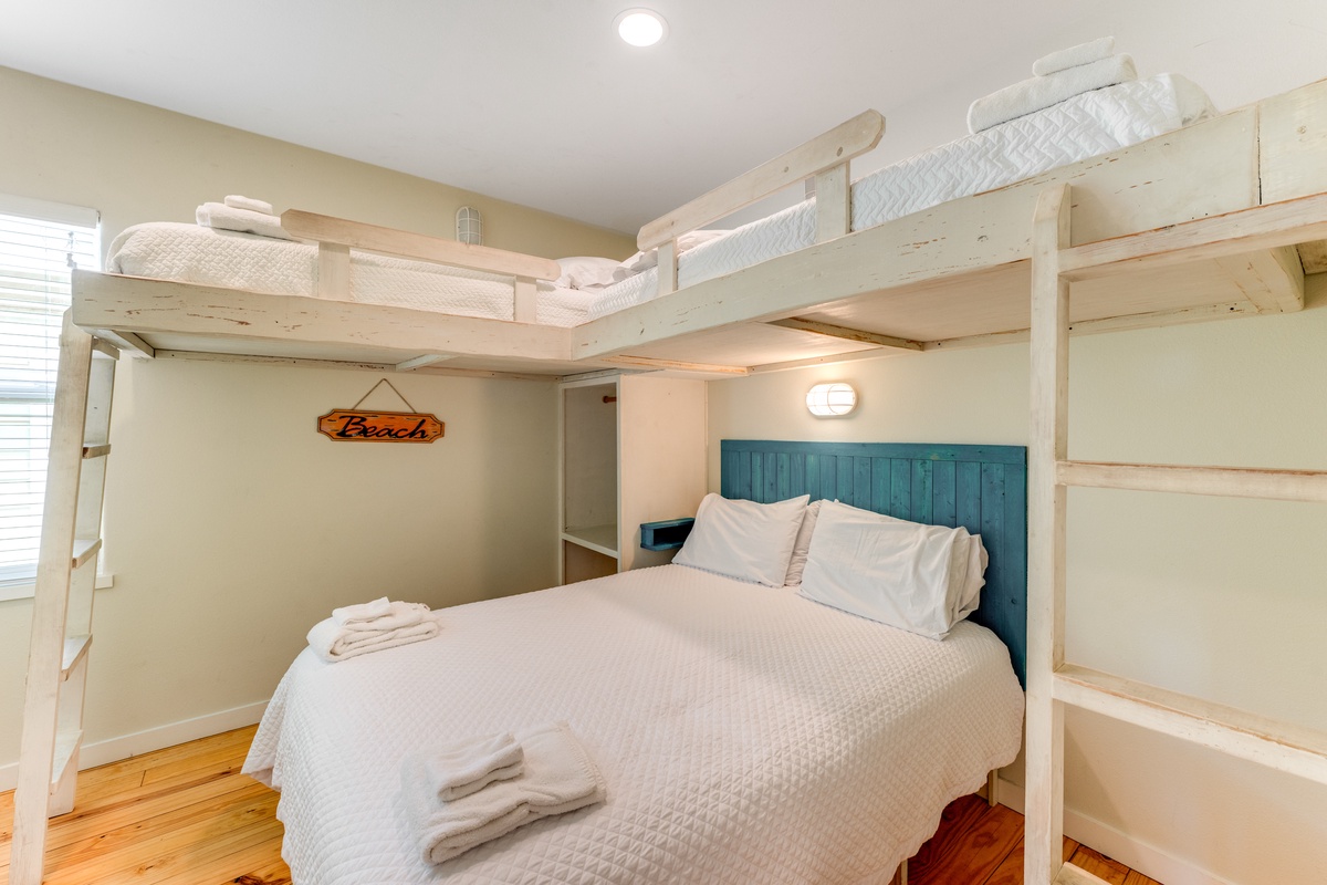 Sleep soundly in your cozy bunk room with fresh linens and charming coastal touches that make bedtime an adventure.