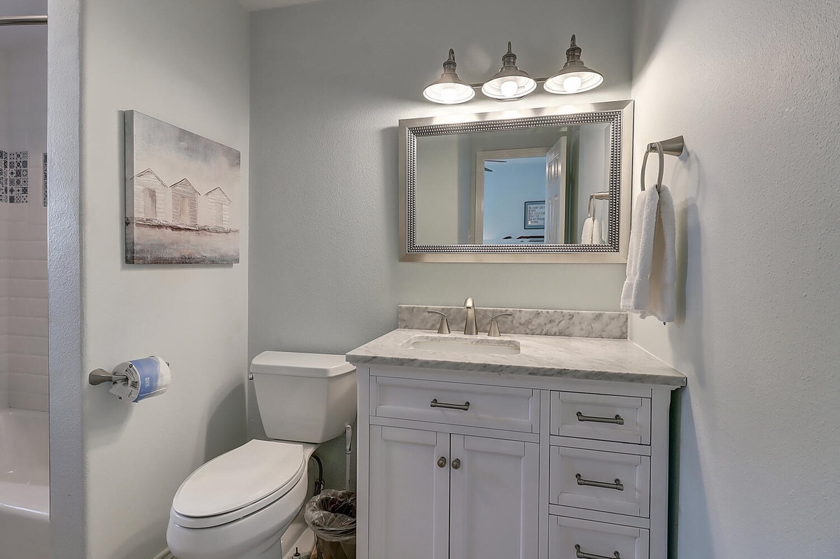 Freshen up in your beautifully appointed bathroom with elegant marble counters and designer fixtures creating a spa-like retreat.