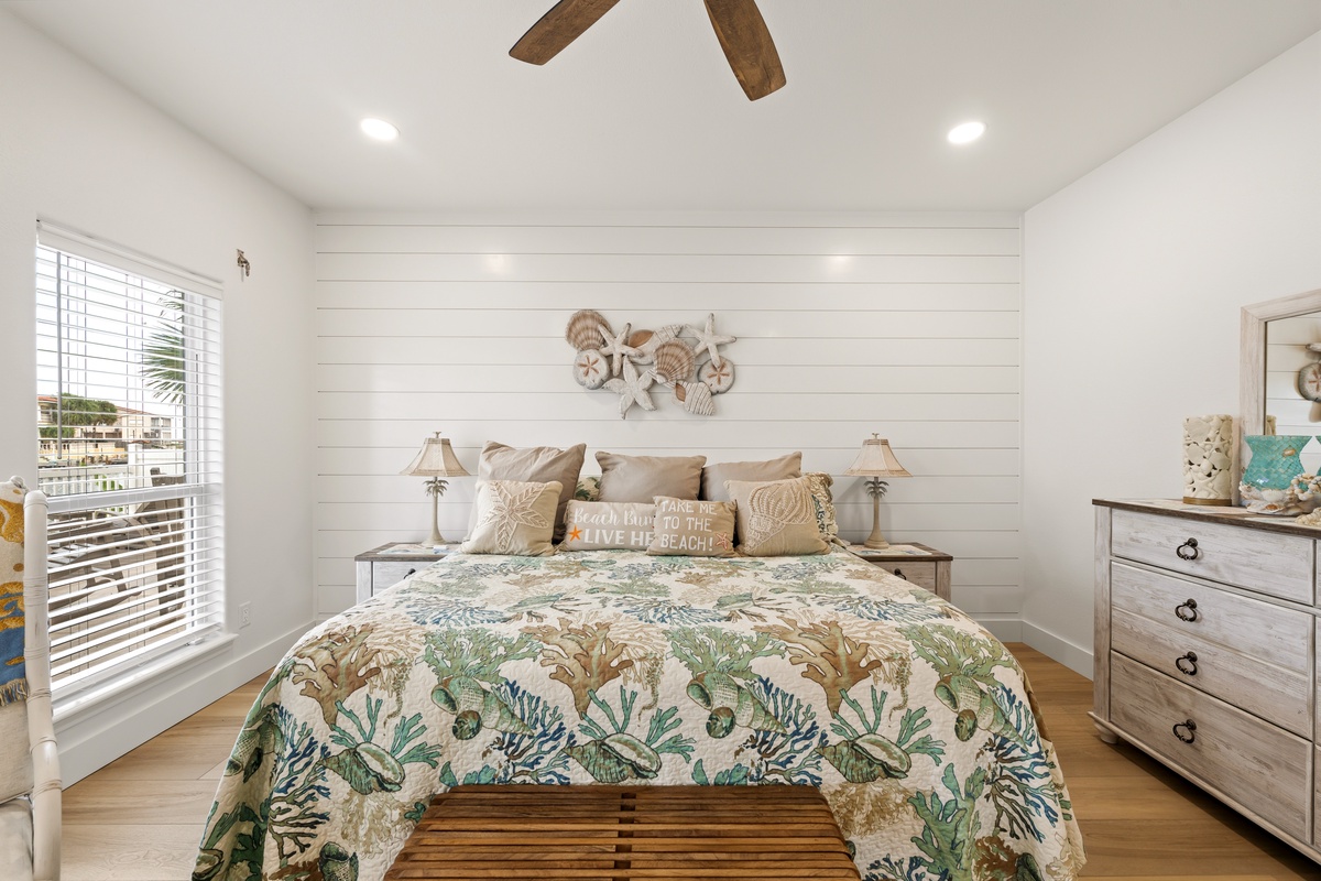Relax in your coastal retreat where shiplap walls, soft linens, and beachy decor create a peaceful sanctuary for rest and rejuvenation.