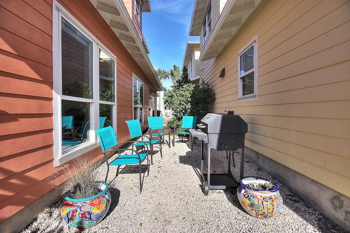 Fire up your favorite BBQ recipes in your private outdoor space, complete with comfortable seating and tropical touches.