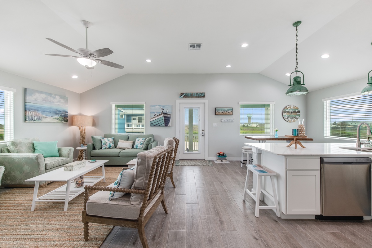 Your coastal-inspired open living space blends comfort with style, where soft sea tones and natural textures create the perfect retreat.