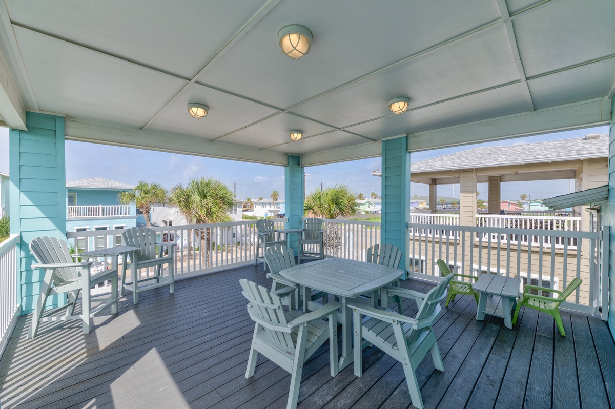 Relax on your covered terrace with ocean breezes and charming coastal views, perfect for morning coffee or evening gatherings.