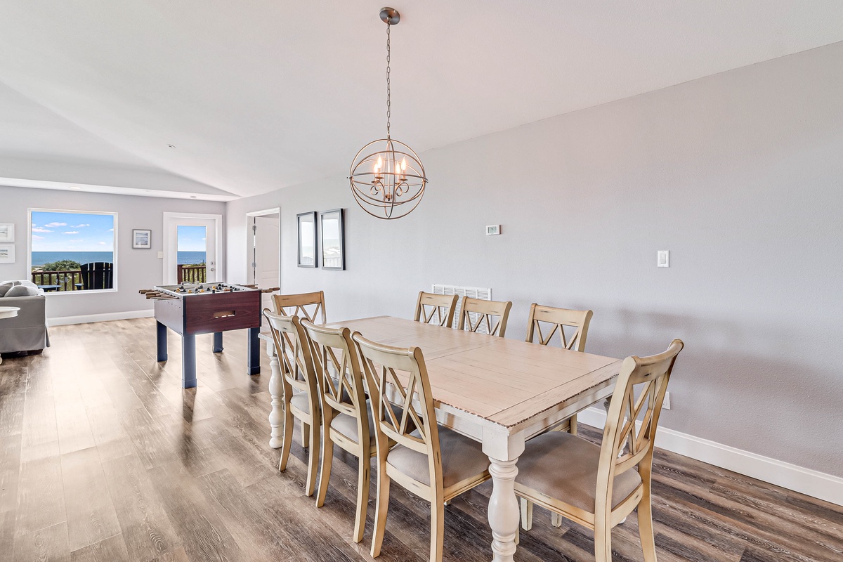 Gather around this spacious dining table for memorable meals with stunning ocean views through your windows.