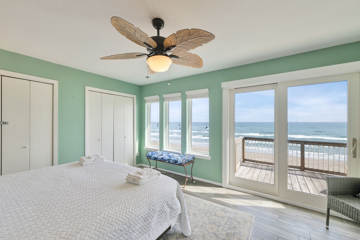 Wake up to endless ocean views from your serene bedroom, where soft sea breezes drift through windows and waves create your morning soundtrack.