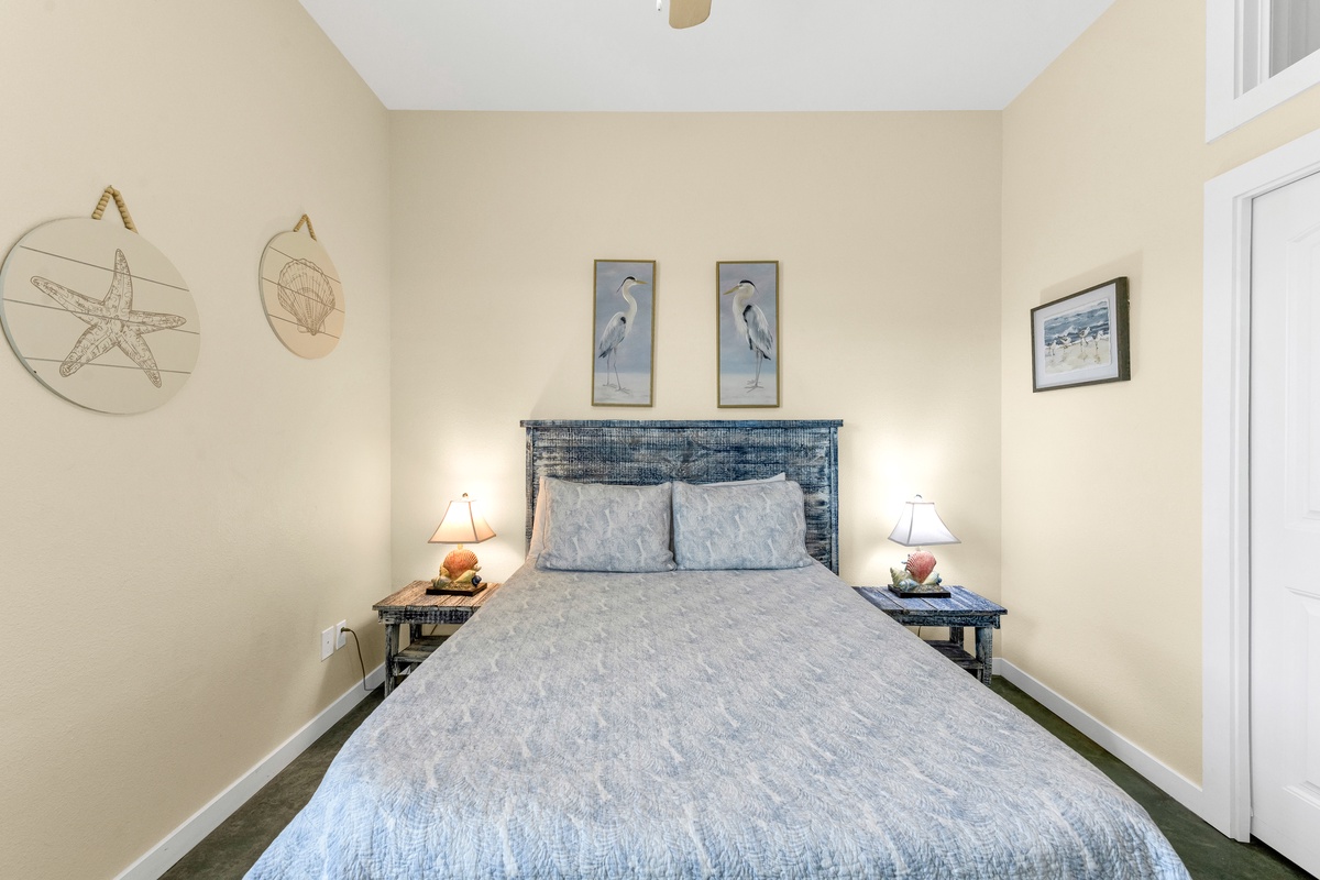Drift off in this coastal-inspired bedroom where soft blues meet nautical touches, creating your perfect seaside sanctuary for restful nights.