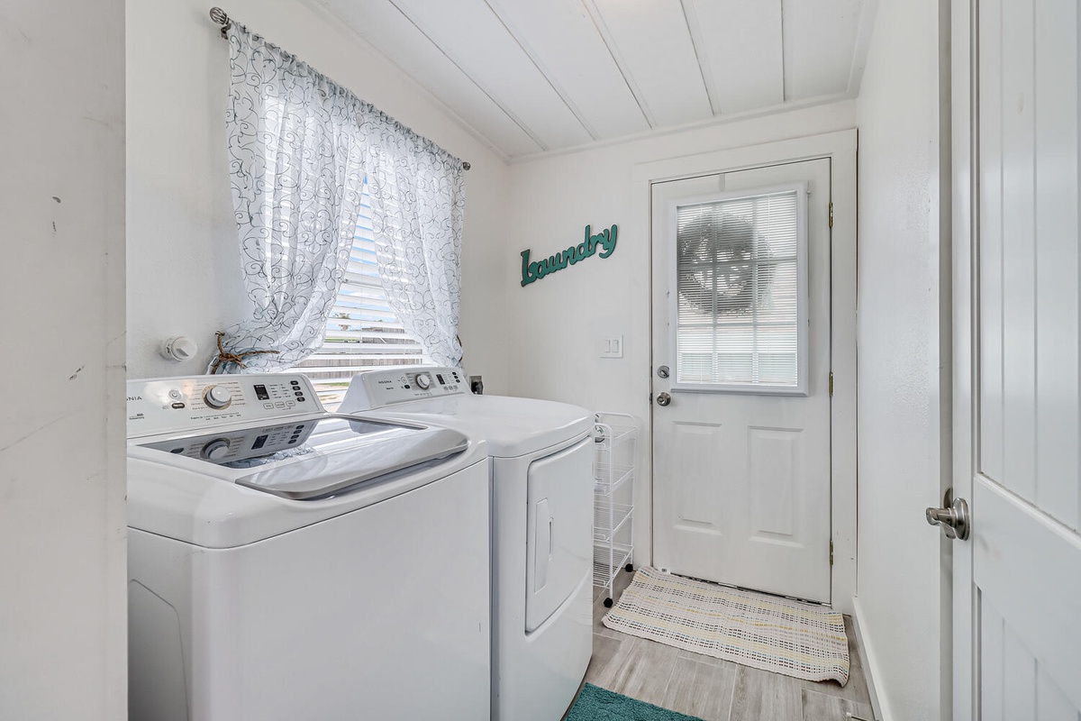Your own dedicated laundry room makes extended stays effortless, with full-size washer and dryer plus natural light from the window.